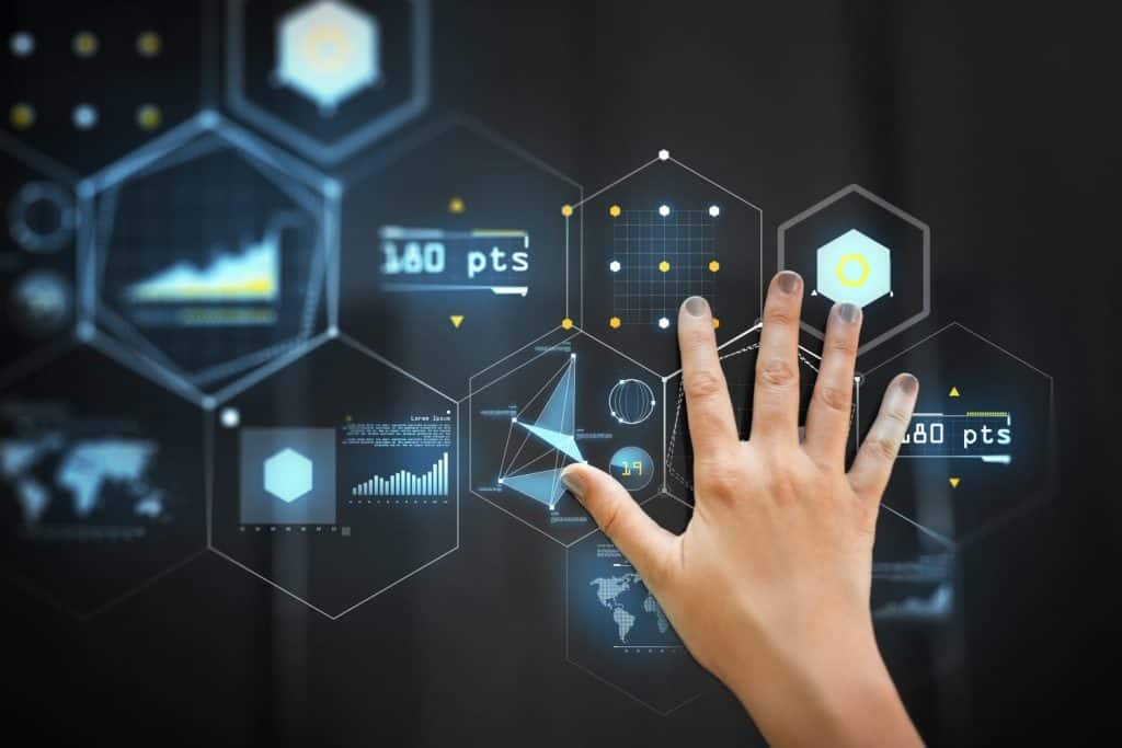 technology and people concept - hand using black interactive panel with virtual projections of charts