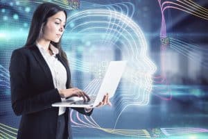 Artificial intelligence concept with businesswoman using laptop on digital screen background with glowing microcircuit in human face silhouette in profile