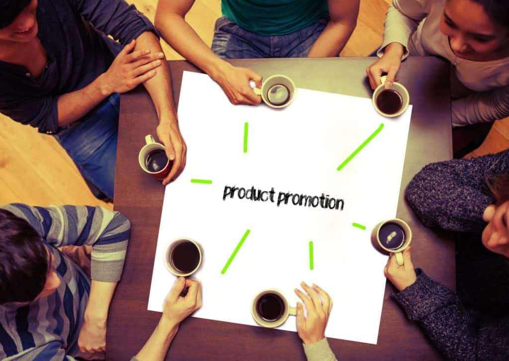 Student drinking coffee sitting around page saying the word product promotion