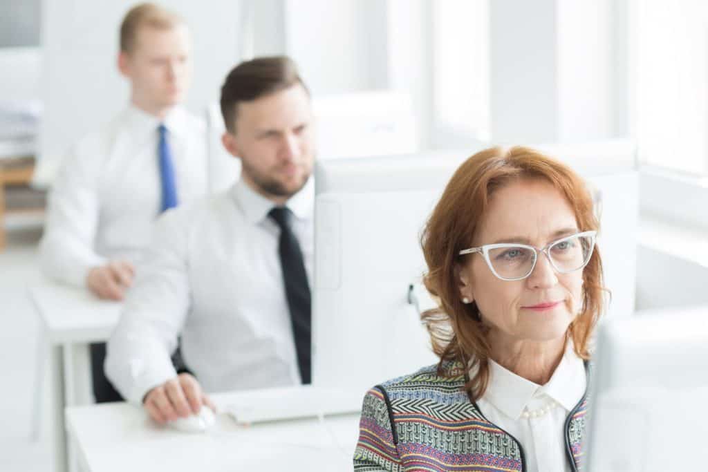 Professional team of corporate call centre at work