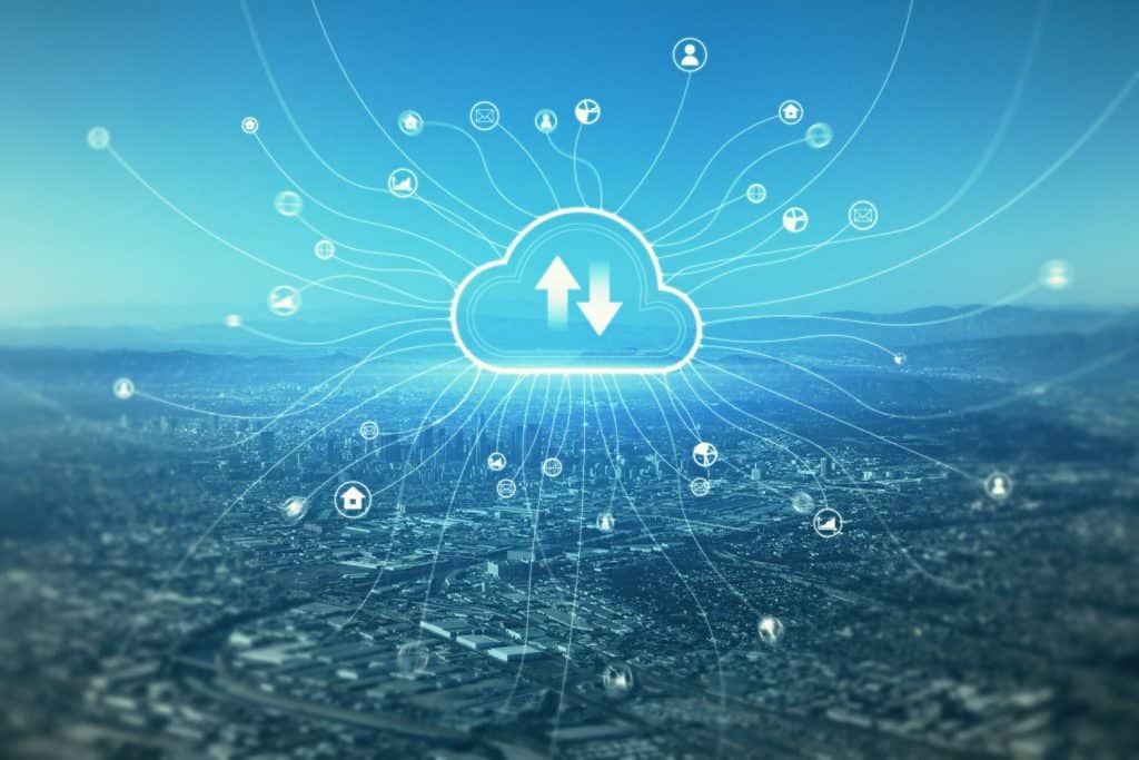 Data storage, smart city and cloud technologies concept with digital social networking internet icons connected with cloud sign with oppositely directed arrows above city landscape