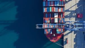 Aerial top down photo of industrial cargo container logistics terminal